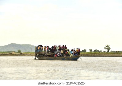 Villagers Travell In A Boat   At Milpara In  Kamrup District Of Assam India  On Thursday 25th August 2022