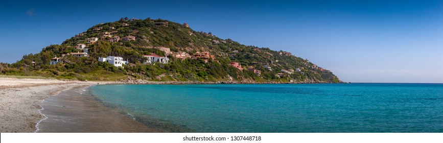 Villas on hill near crystal clear mediterranean sea. Torre Delle Stelle, Sardinia, Italy