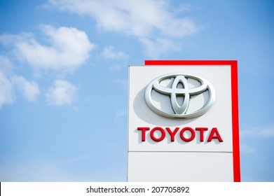VILNIUS - JULY 6: Toyota logo on July 6, 2014 in Vilnius, Lithuania. Toyota Motor Corporation is a Japanese automotive manufacturer. It is the fourteenth-largest company in the world by revenue.