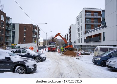 Vilnius, Lithuania - 02 09 2021: Workers Are Fixing Broken Pipes Under The Road In Winter