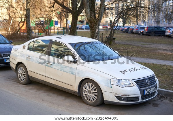 Vilnius,\
Lithuania - 03 20 2021: Old police car on the street. Not used\
anymore, marks are not removed properly.\
