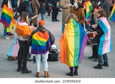 Vilnius, Lithuania - March 21 2022: Young People In A Circle With Rainbow Flags, Supporting Gay Rights And Diversity