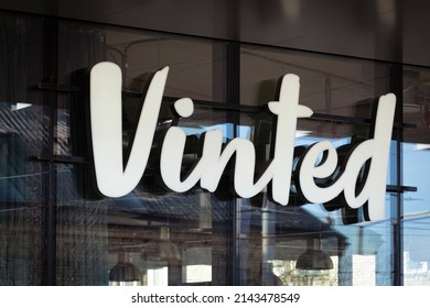 Vilnius, Lithuania - March 25, 2022: Vinted Logo Sign On Office Building Wall. Vinted Is Online Marketplace For Buying, Selling And Exchanging New Or Secondhand Items, Mainly Clothing And Accessories