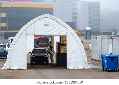 Vilnius, Lithuania - November 10 2020: Mobile Testing Station Tent, Hot Spot For Swab Test During Coronavirus Or COVID19 Outbreak With Paramedic And Car