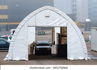 Vilnius, Lithuania - November 10 2020: Mobile Testing Station Tent, Hot Spot For Swab Test During Coronavirus Or COVID19 Outbreak With Paramedic And Car