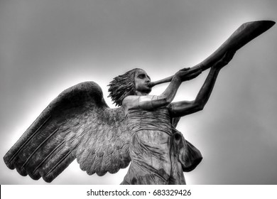 Vilnius, Lithuania. Statue Of An Angel Blowing A Trumpet In Main Square 