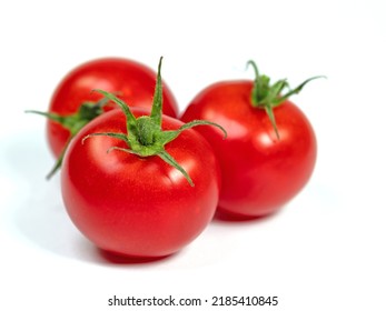 Vine Tomatoes Isolated Against White Background