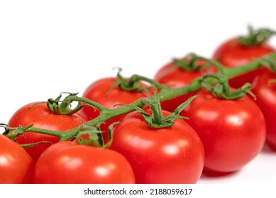 Vine Tomatoes Isolated Against White Background