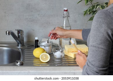 Vinegar, Baking Soda, Lemon, Natural Sponge, Toothbrush And Towels On The Kitchen Sink. DIY Cleaning With Natural Products. Zero Waste.