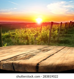 Vineyard At Sunset In The Chianti Region In Italy And Dirty Table Place 