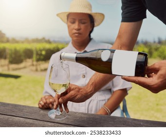 Vineyard, woman and waiter with pouring wine for tasting, drinking and outdoor in France. African person, farm and alcohol bottle with glass to relax, break and rest for self care on adventure - Powered by Shutterstock