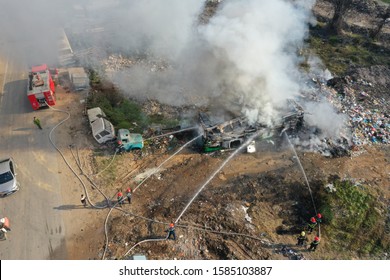 Vinh Phuc, Vietnam December 9, 2019:
A Fire At A Car Parking Lot In Te Lo Commune, Yen Lac District, Vinh Phuc Province On A Dry, Sunny Afternoon.