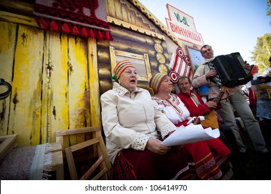 VINNICI, LENINGRAD REGION, RUSSIA - JUNE 10: Local people during celebrate the annual holiday Vepsian national culture "Tree of Life" (vepssk."Elo-p u"), June 10, 2012 in the village Vinnici, Russia.