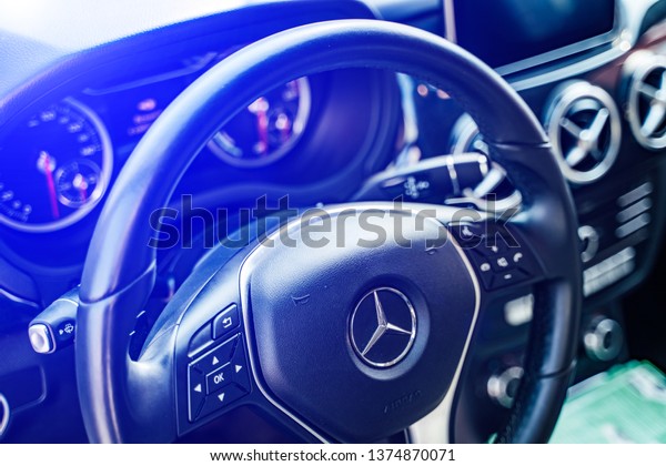 Vinnitsa, Ukraine - April, 2019. Electric car\
Mercedes - new model car presentation in showroom - steering wheel\
and dashboard view