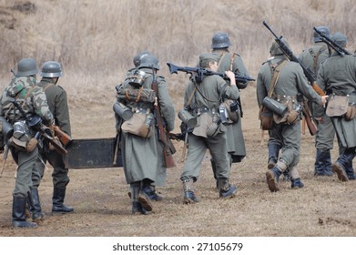 VINNITSA, UKRAINE - MAR 21: Members of a history club called Red Star wears a historical German uniform as he participates in a WWII reenactment in Vinnitsa, Ukraine on March 21, 2009.