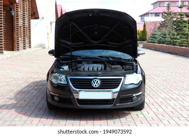 Vinnytsia, Ukraine; April 03, 2020. Black Volkswagen Passat B6 open hood. Volkswagen Passat B6 engine. Editorial photo.