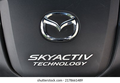 Vinnytsia, Ukraine; July 14, 2022. Mazda CX 5 Engine Cover. Close Up Mazda Skyactiv Logo. Mazda CX 5 Skyactiv Emblem. Front View.