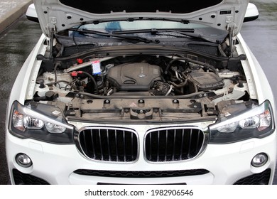 how to open the hood of a bmw x5