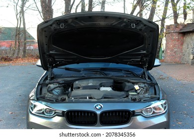 how to open the hood of a bmw 328i