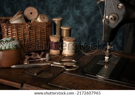 Vintage 1880s sewing machine and sewing accessories