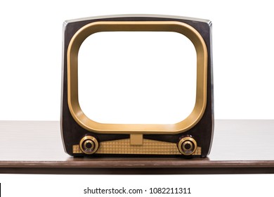 Vintage 1950s television on table isolated on white with empty screen and clipping path.