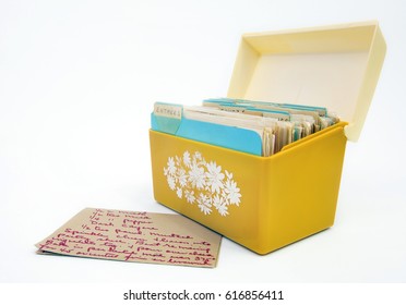 Vintage 1970s Yellow Recipe Box With  Card. Isolated.