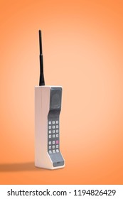 Vintage 1980's Mobile, Cell Phone on Retro Orange Background with Space for Copy and Text