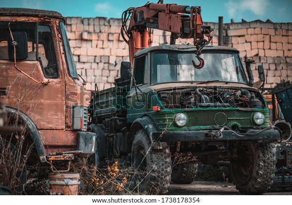 vintage abandoned
trucks in outside space
