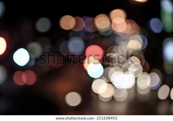 Vintage abstract blur bokeh of Evening\
traffic jam on road in city , vintage\
effect