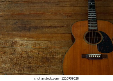 Acoustic Guitar On Wood Background Stock Photo (Edit Now) 134601566