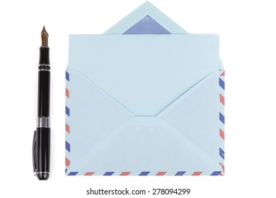 vintage air mail envelope with a letter and fountain pen over white - Powered by Shutterstock