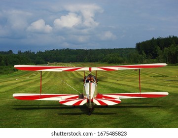 
Vintage airplane biplane on an airfield