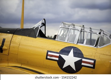 Vintage Airplane Cockpit With Yellow Fuselage