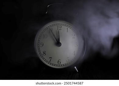 ** Vintage Alarm Clock at Midnight in Mysterious Smoky Atmosphere - Powered by Shutterstock