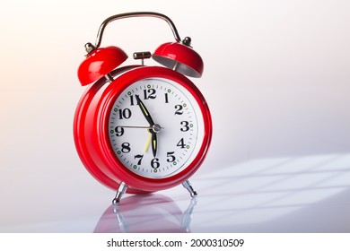 Vintage Alarm Clock on desk - Shutterstock ID 2000310509