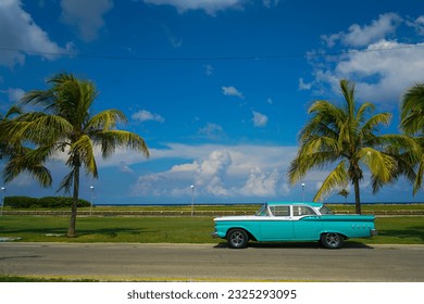 Vintage American car in Cuban coast  - Powered by Shutterstock