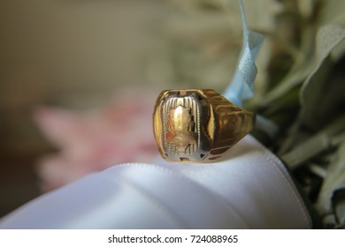 Vintage Antique Class Ring Tied To A Bridal Wedding Bouquet