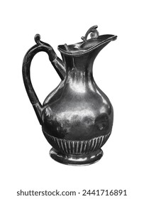 Vintage antique silver metal jug with lid on white background. Old jug oriental culture kitchen utensils.