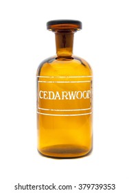 A Vintage Apothecary Jar With Cedarwood Etched On Front