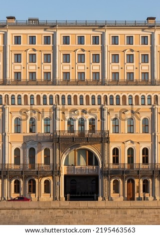 Vintage architecture classical facade building at sunset front view