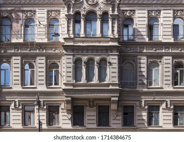 Vintage architecture facade building in Pseudo-Russian style.  Front view close up. Electric wires.