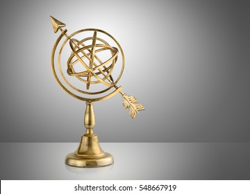 Vintage armillary sphere on gray background