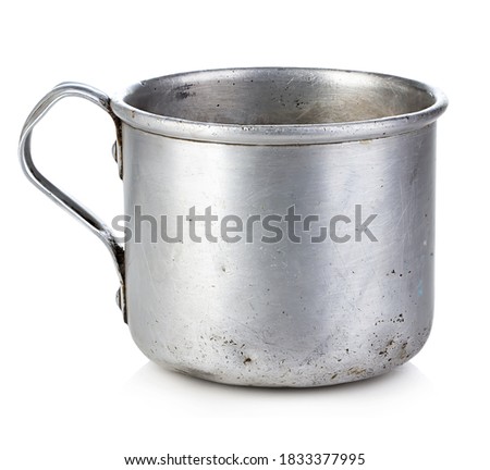 Vintage army cup isolated on a white background.