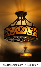 Vintage Art Deco Ceiling Lamp Fixture In Dark Hallway