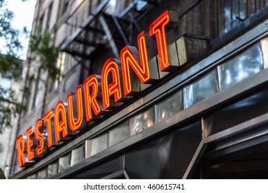 Vintage art deco neon restaurant sign on a city street storefront. - Powered by Shutterstock