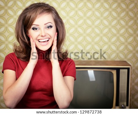 vintage art portrait of young smiling woman looking out at camera in room with wallpaper and tv set from 70s, retro stylization, toned