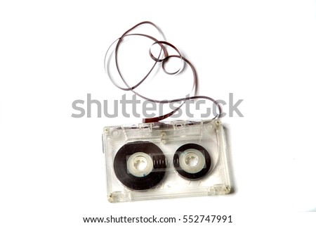 vintage audio cassette with tangled tape