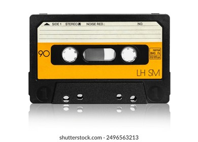 Vintage audio cassette tape  isolated on white reflecting background