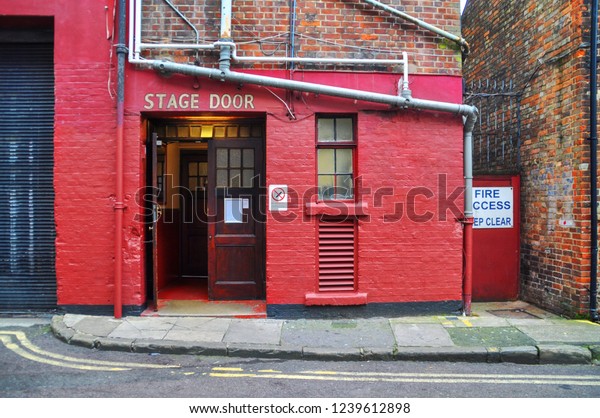 Vintage back door to the stage with the\
inscription \