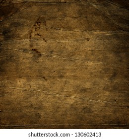 Vintage background, burned old paper texture; suitable for Photoshop blending purposes